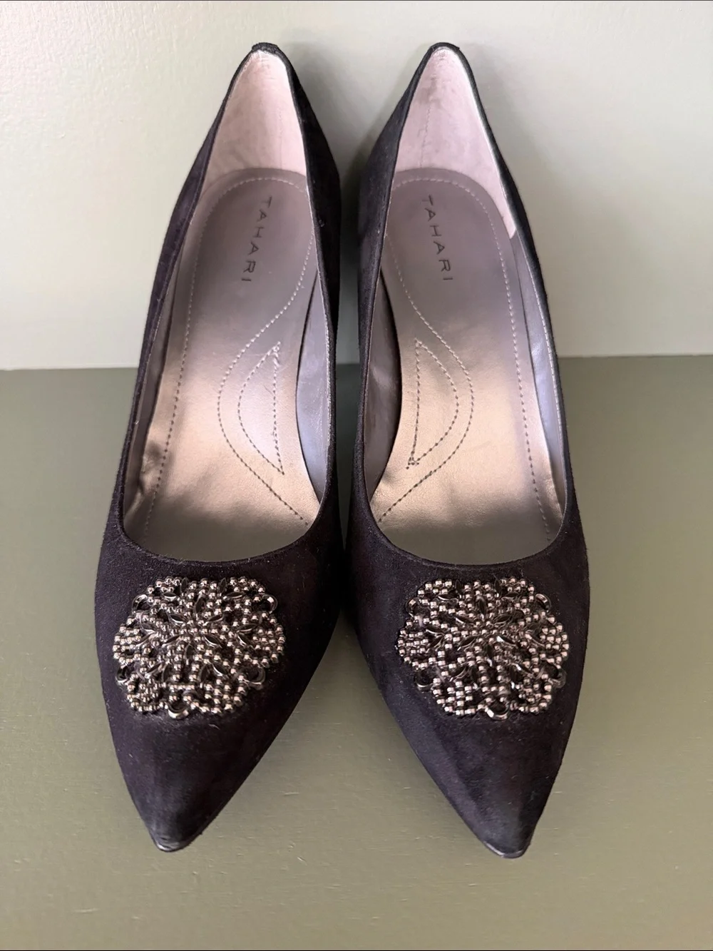 Tahari Black Pointed-Toe Heels with Metallic Brooch Detail